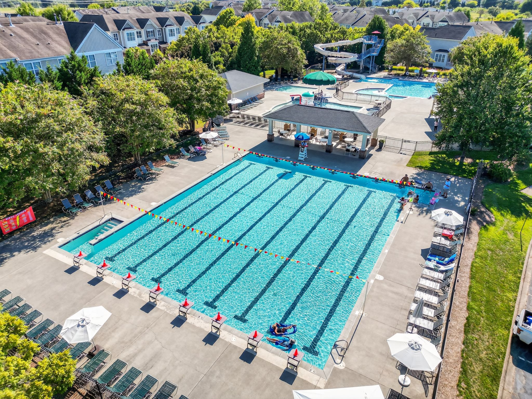 Aerial shot of a community lap pool on a sunny day